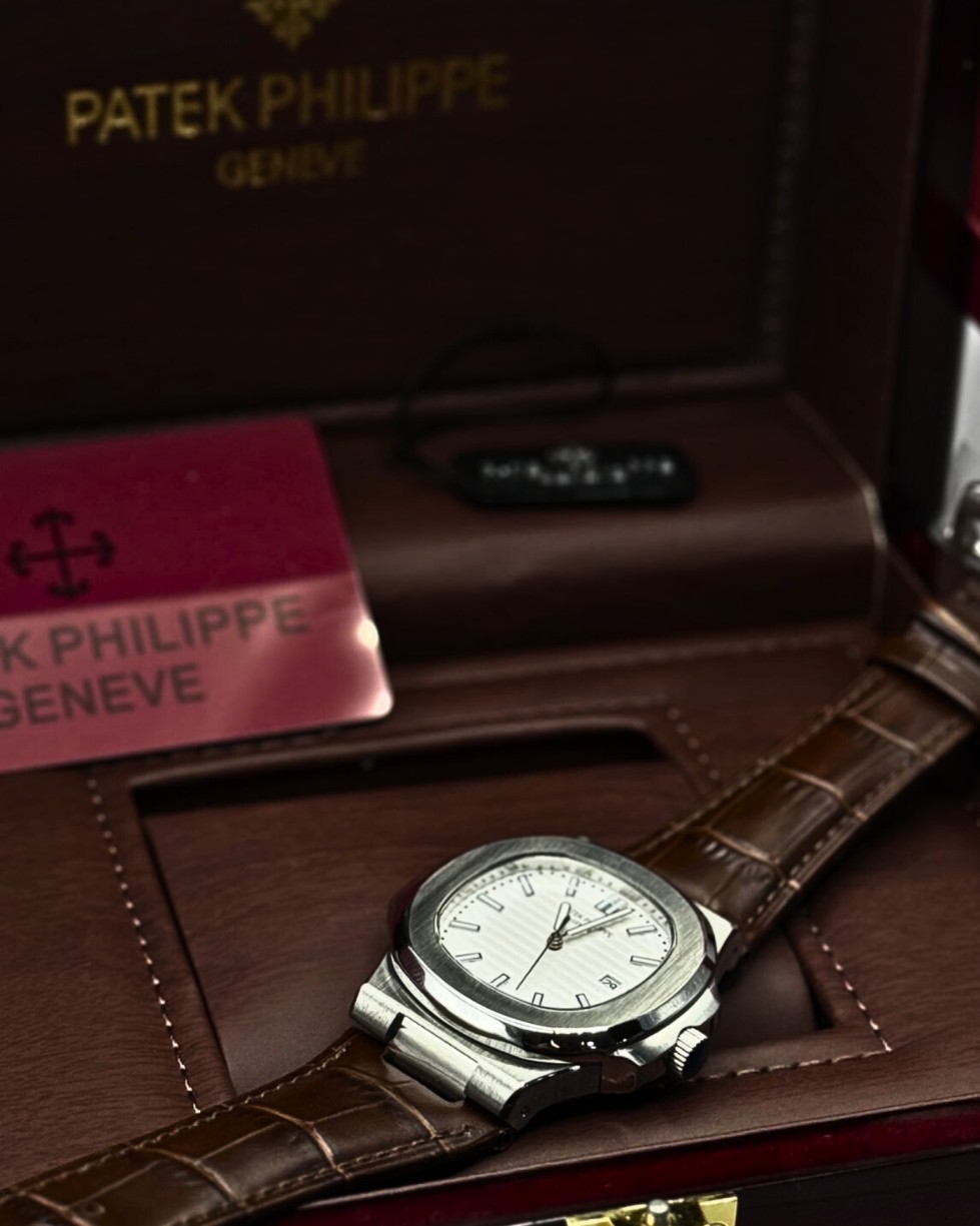 Patek Philippe Nautilus – Stainless Steel with White Dial & Brown Leather StrapPatek Philippe Nautilus – Stainless Steel with White Dial & Brown Leather Strap